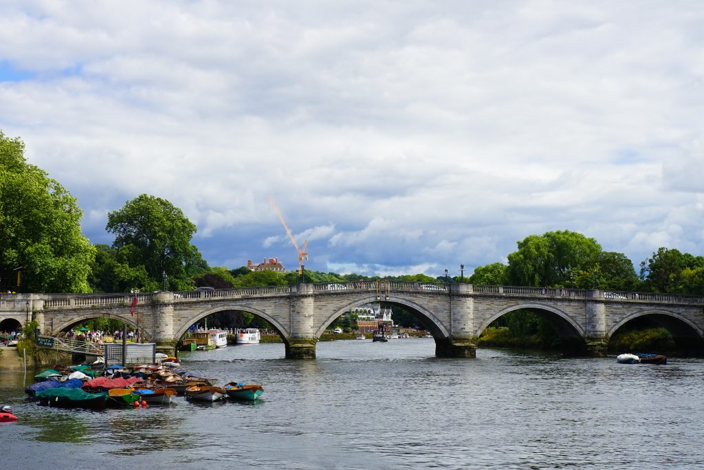 A photo depicting Richmond Bridge along the River Thames in London.
